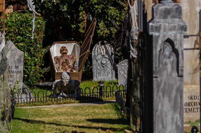 Graveyard Entrance Skull Orchard Cemetery Crawling Ghoul Skeleton in Casket
