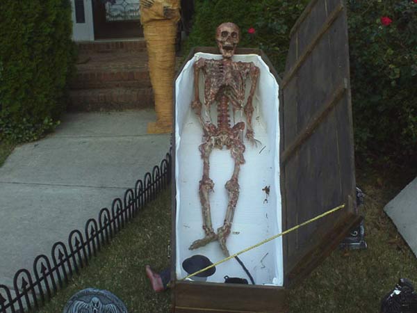 Halloween Corpse in wooden Coffin
