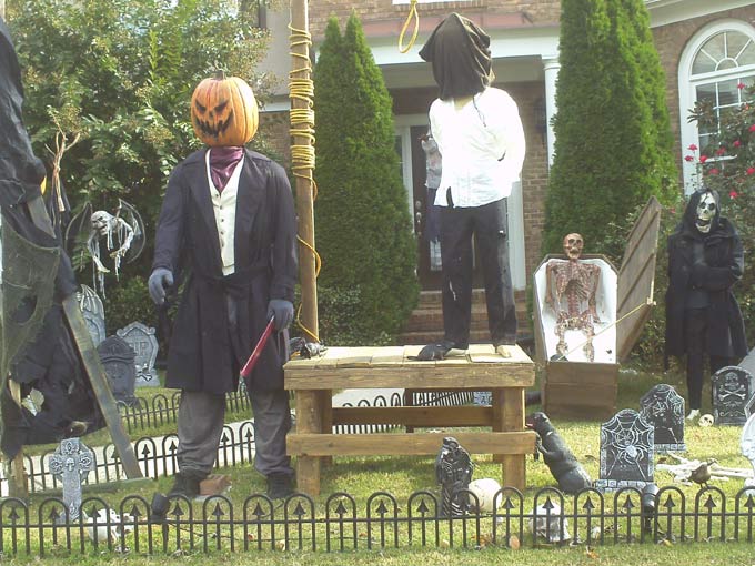 Day View of Gallows, Executioner, Corpse in Coffin and Grave Yard Ghoul