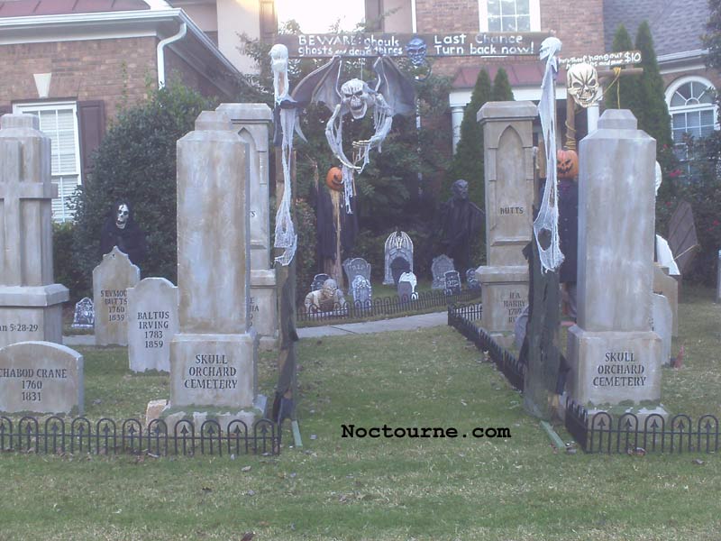 Night View of Graveyard Crawling Ghoul Mummy and Corpse in Coffin