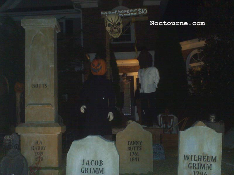 Night View of our Graveyard Skull Orchard Cemetery with Gallows, Executioner and Corpse in Coffin