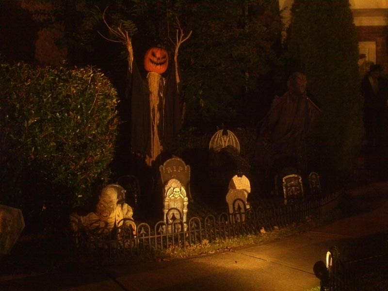 Night View Halloween Graveyard Cemetery with Sleepy Hollow Scarecrow and Black Spectre