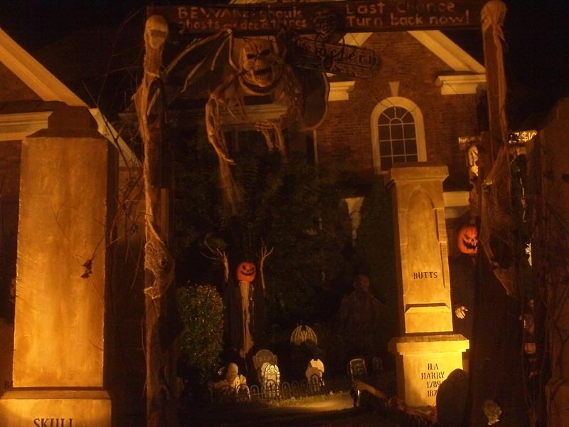 Night View of Halloween Graveyard Entrance Banner Bat Skeleton Skull Orchard Cemetery Plus Scarecrow