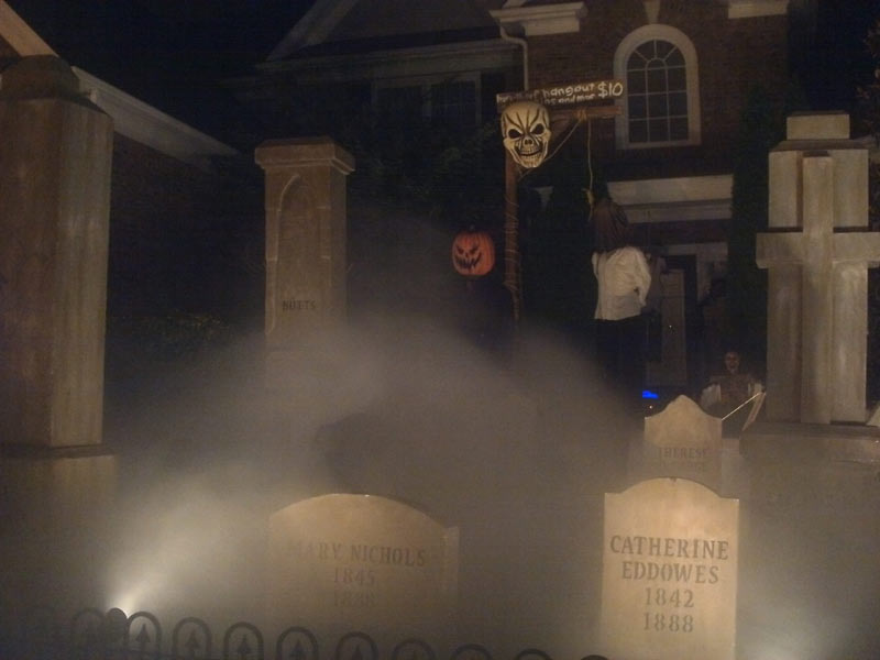 Night View of Halloween Graveyard Cemetery with Crypt Ghoul Bram Stoker Head Stone