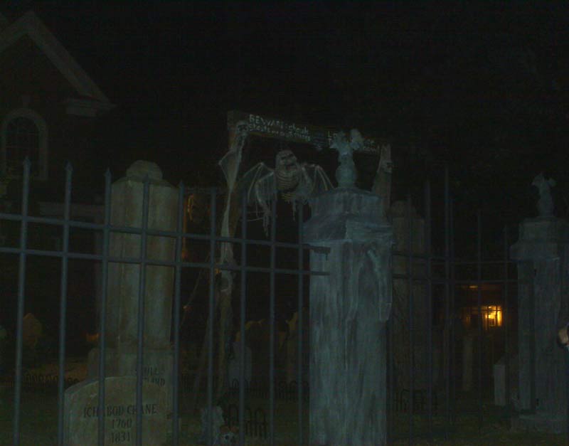 Night View of Halloween Graveyard Cemetery with Crypt Ghoul Bram Stoker Head Stone