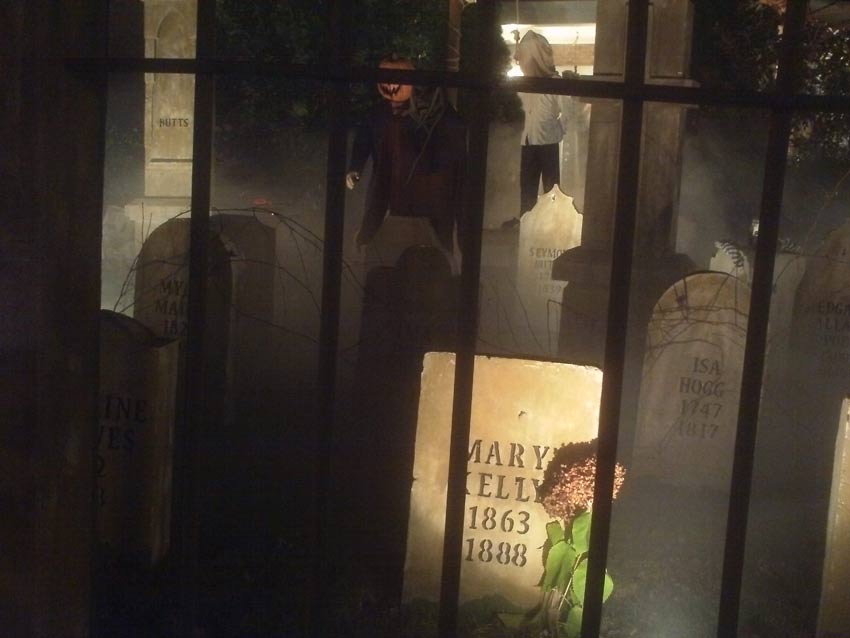 Night View of Halloween Graveyard Entrance Bat Skeleton Skull Orchard Cemetery