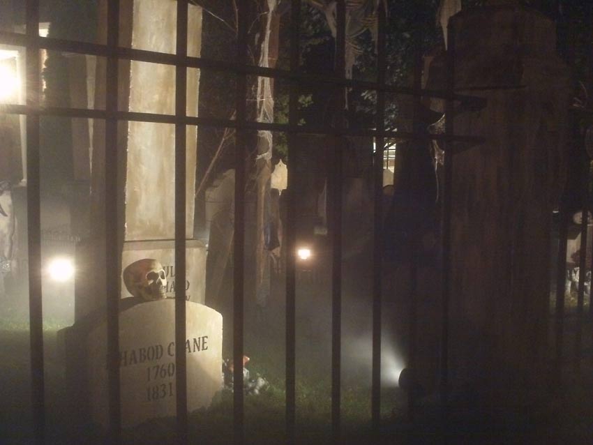 Night View of Halloween Graveyard Cemetery with Crypt Ghoul