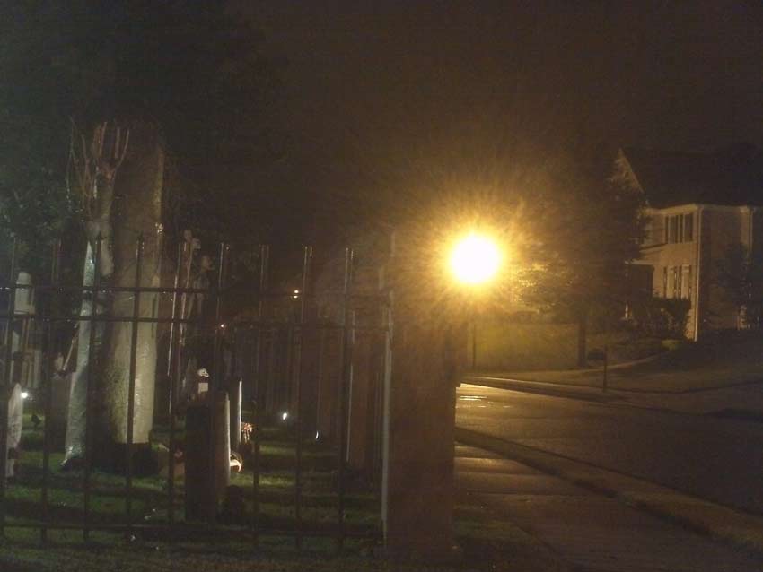 Night View of Side Halloween Graveyard Cemetery with Tombstones