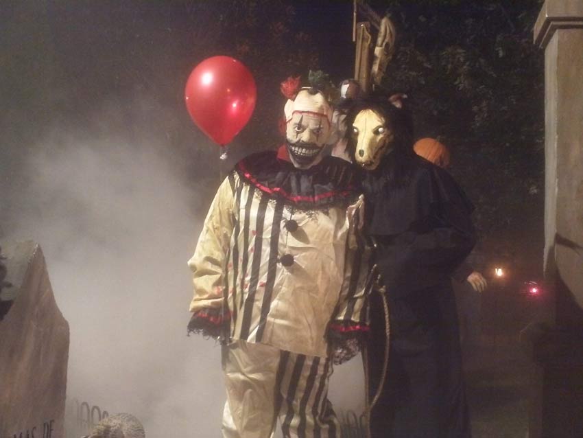 Night View Halloween Graveyard with PennyWise Clown and Wolf Creature in Fog