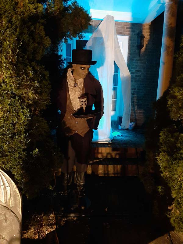Night View of Front Gate Entrance to Halloween Graveyard Cemetery