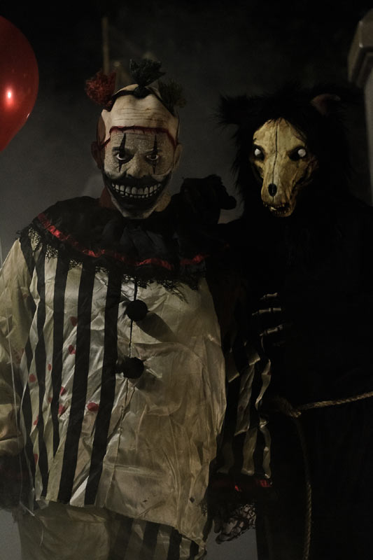 Night View Halloween Graveyard with PennyWise Clown and Wolf Creature in Fog