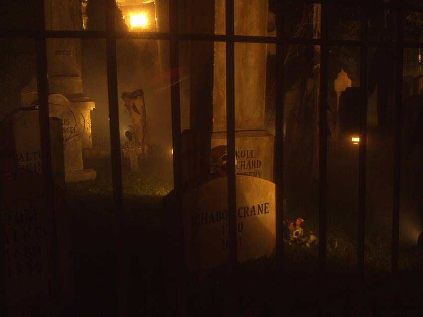 Night View of Halloween Graveyard Entrance Banner Bat Skeleton Skull Orchard Cemetery Plus Scarecrow