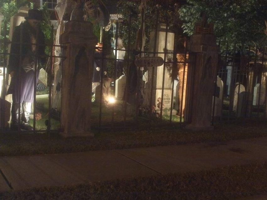 Night View of Front Gate Entrance to Halloween Graveyard Cemetery