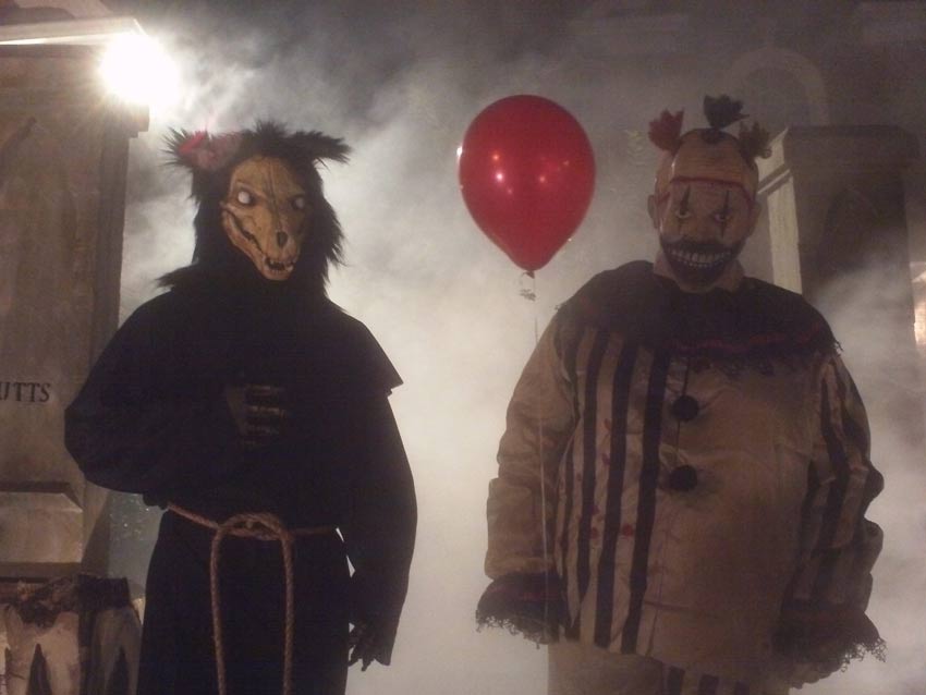 Night View Halloween Graveyard with PennyWise Clown and Wolf Creature in Fog