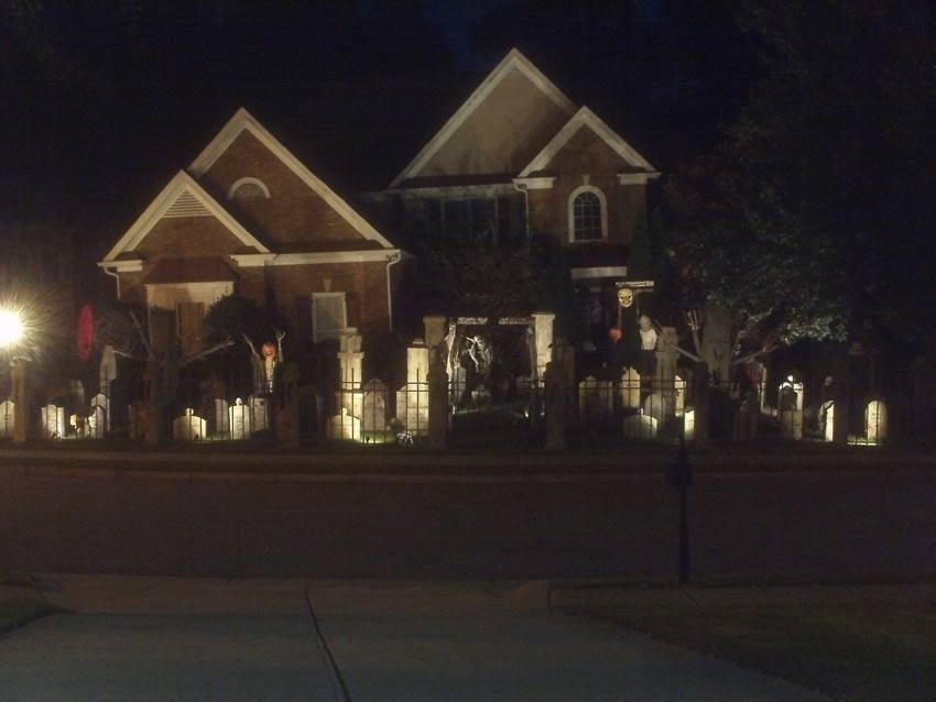 Night View of Front Gate Entrance to Halloween Graveyard Cemetery
