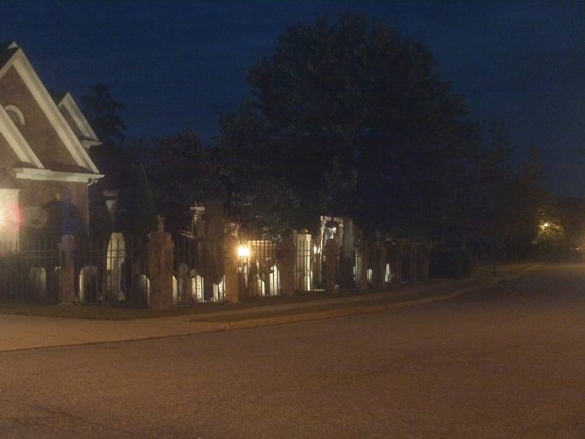 Night View of Front Gate Entrance to Halloween Graveyard Cemetery
