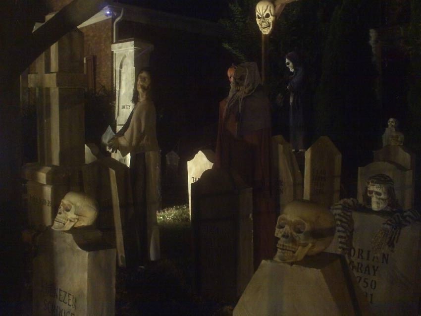 Night View of Front Gate Entrance to Halloween Graveyard Cemetery